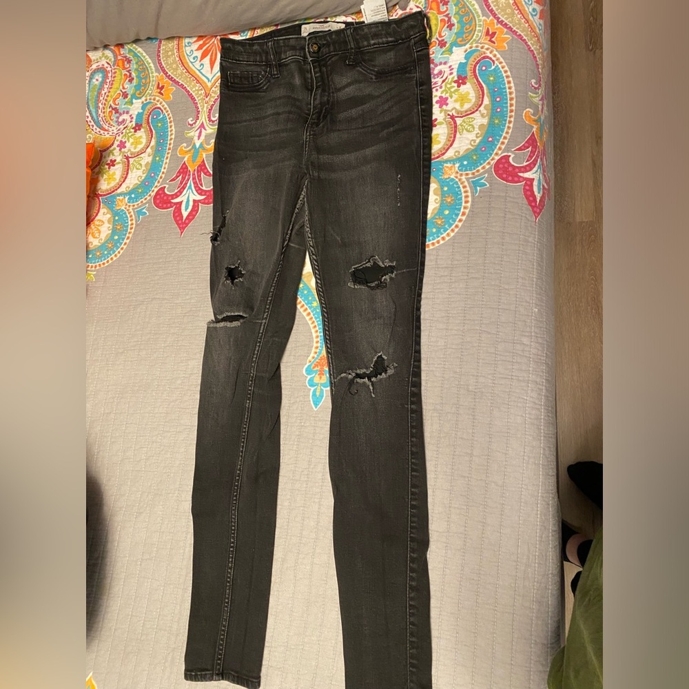 Hollister high-rise skinny jeans in classic black with a distressed finish